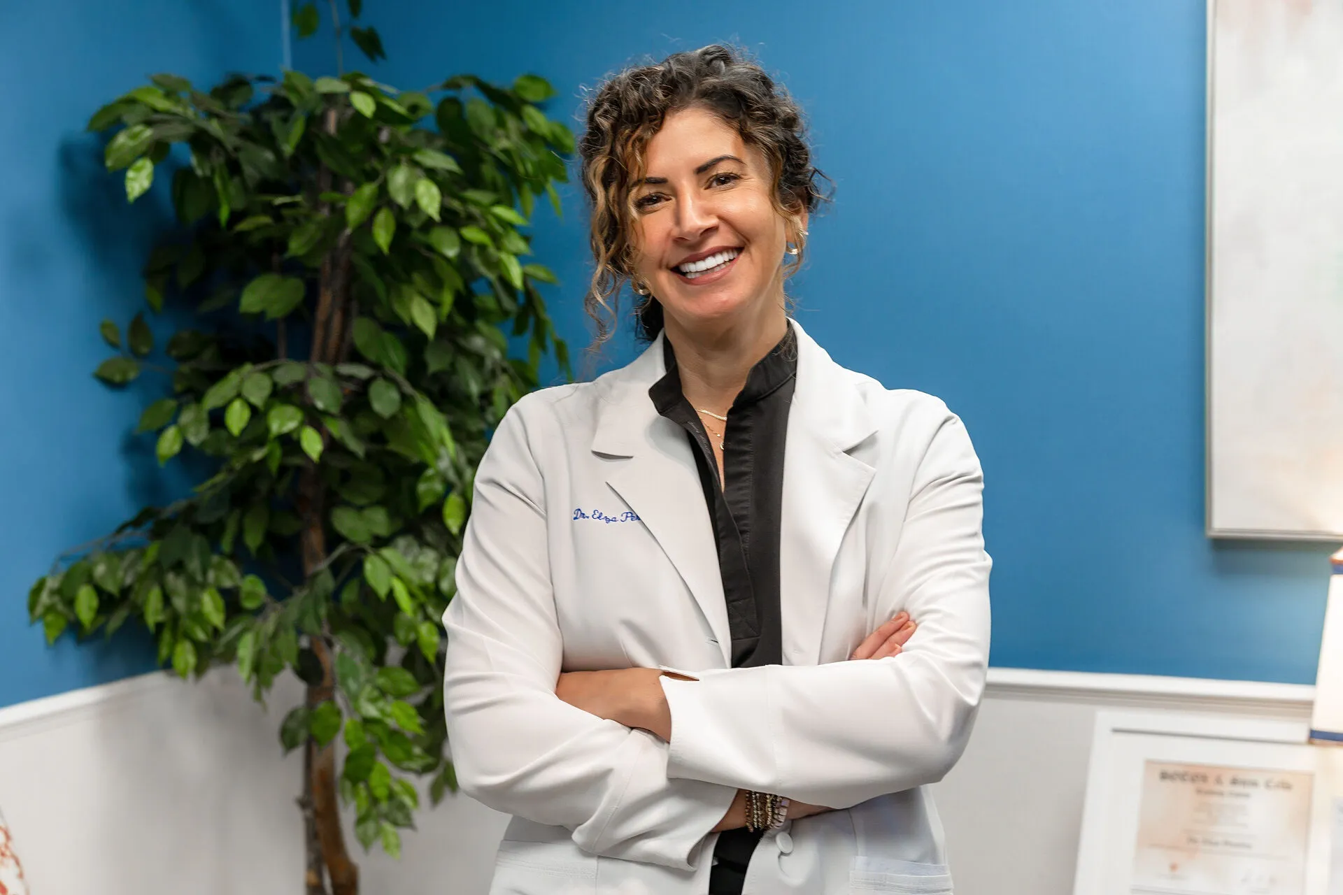 Dr. Elza M. Pereira in the office